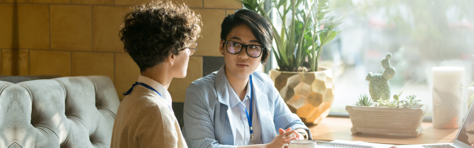 two people talking in the table